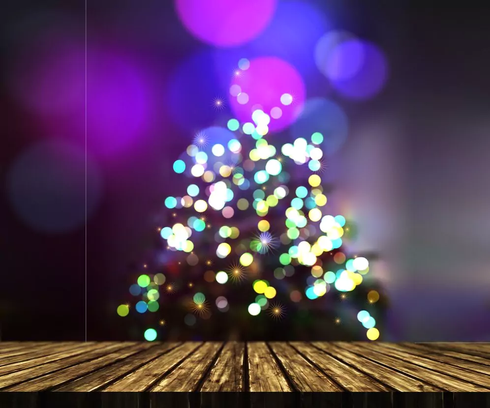 3d-render-wooden-table-against-defocussed-christmas-tree-background